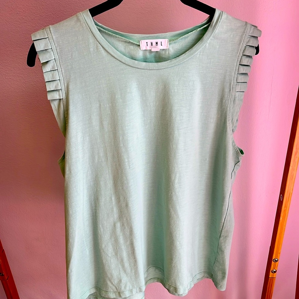 T H M L  shirt with short sleeves .Size L.Color Teal.